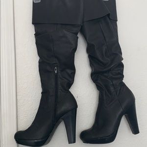 Black knee high, heeled boots